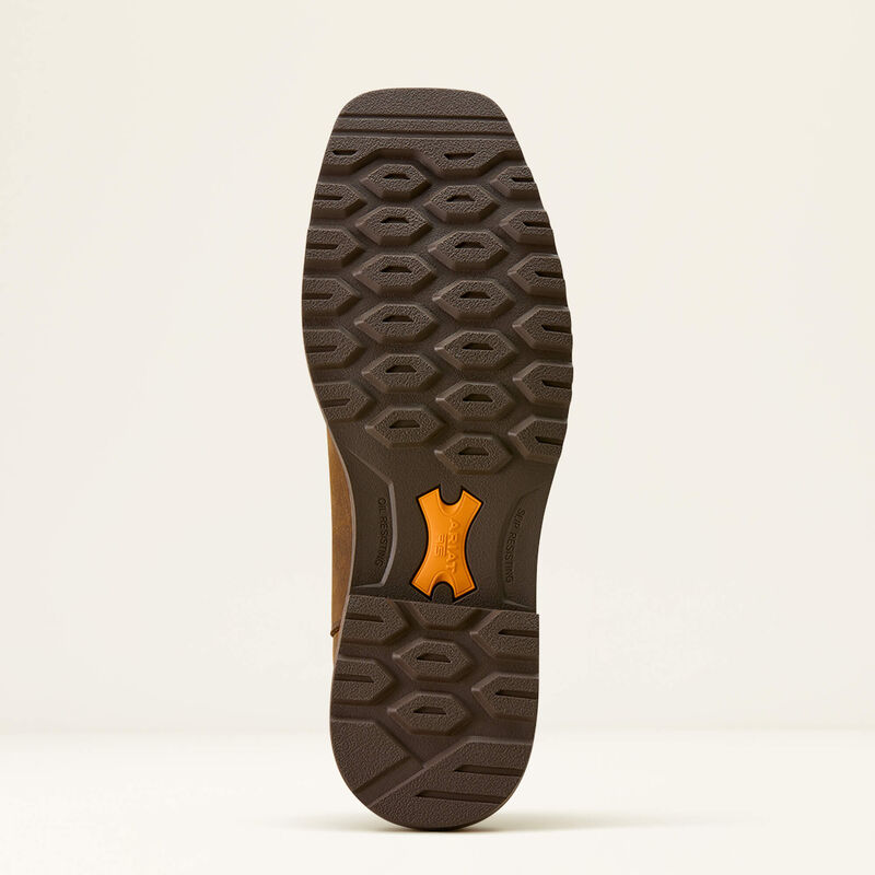 Close-up of a shoe sole with a textured pattern on a beige background