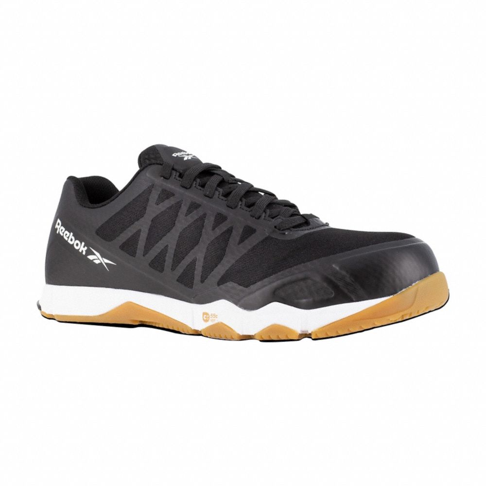 A black and gum Reebok composite toe metal-free work shoe with a mesh upper and a rubber outsole designed for slip-resistance.